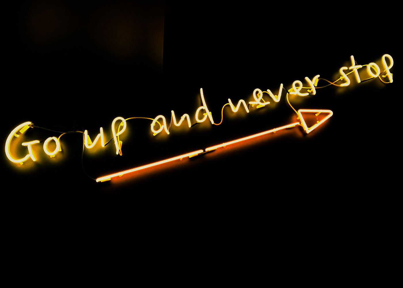Neon sign Go up and never stop